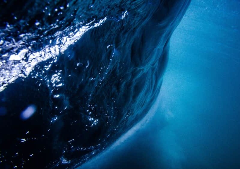 Underwater view of a wave, capturing the dynamic and hidden aspects of Schizoid and Schizotypal Personality Disorders.