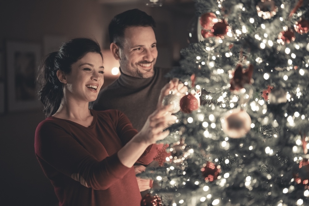 A couple honoring a loved one they lost by starting a new tradition during Christmas