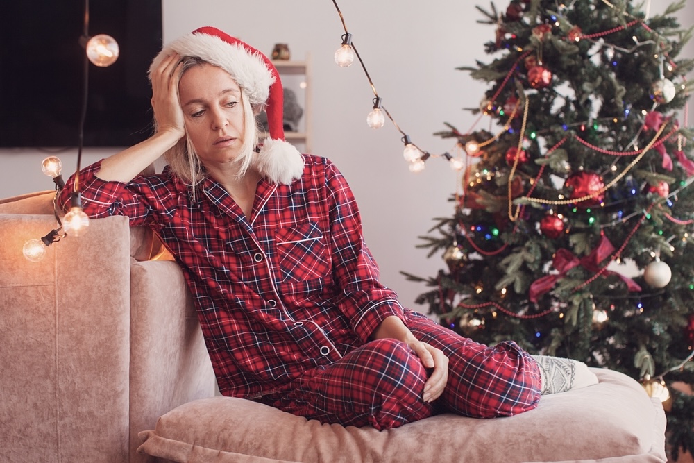 Adult female depressed due to holiday exhaustion