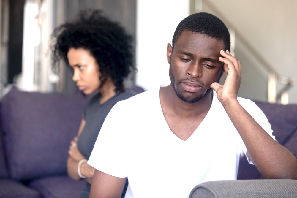 Male partner sad and frustrated when his spouse with PTSD pushes him away
