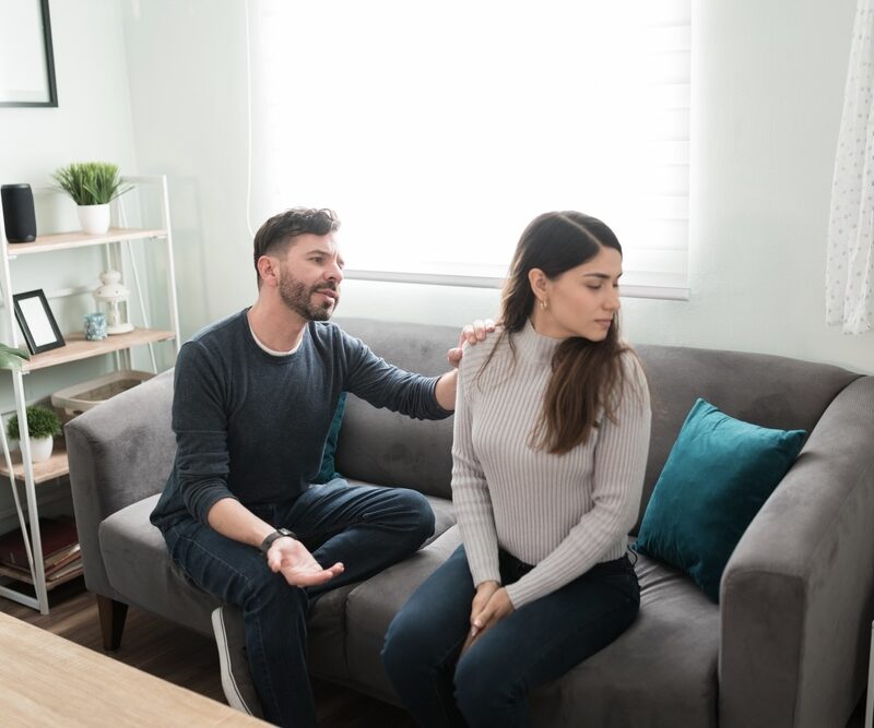 Man trying to talk to his partner about depression