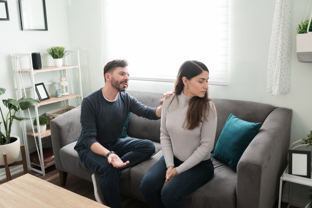 Man trying to talk to his partner about depression